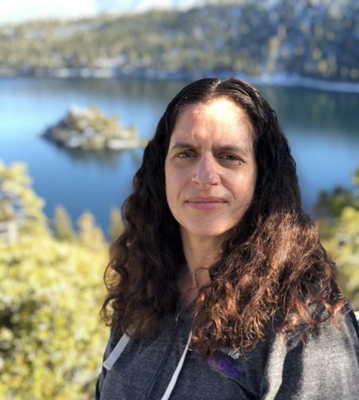 Portrait of Melissa Whaley standing above Emerald Bay